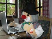 clown working on notebook